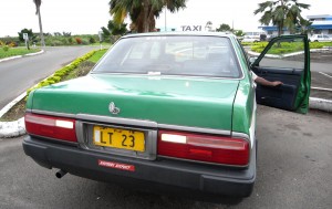 Rear view of Nissan Cedric taxi in Fiji