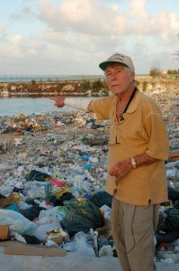 Leon Cooper stands at the garbage pit on Red Beach Leon Cooper stands at the garbage pit on Red Beach