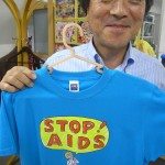 Paradise TV president Tsuyoshi Shiba with the 2009 promo t-shirt