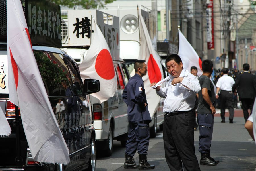 Right-wing groups protest anti-Yasukuni Shrine march in Tokyo Right-wing groups protest anti-Yasukuni Shrine march in Tokyo