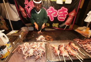 A grilled squid vendor
