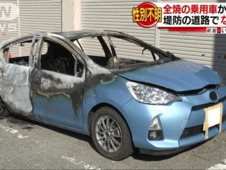 A corpse was found inside a burned-out vehicle on a road in Okazaki City on Friday