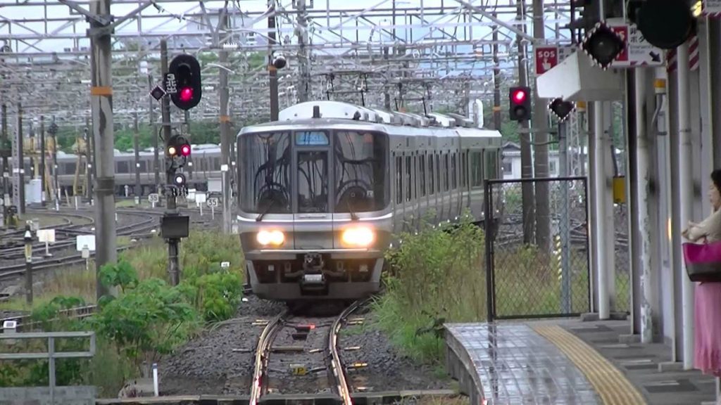 Police have accused a real estate executive of molesting a woman inside a car of the Tokaido Line as it traveled between Kyoto and Maibara stations