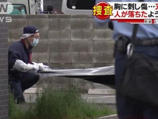 A body believed to be that of a male high school student was found near an emergency staircase of an apartment building on Monday morning