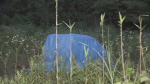 Police retrieved a body from a burned-out vehicle in Nikko City on Wednesday