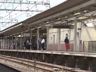 A man shoved a male commuter into a moving train, leaving him with a head fracture on Saturday in Chofu City