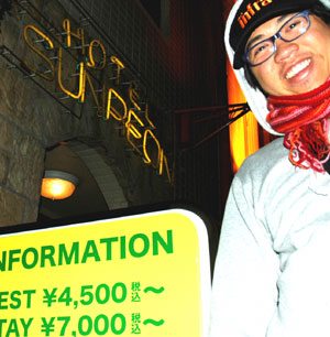Jong Pairez in front of a Shibuya love hotel