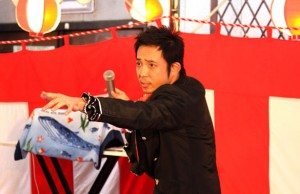 Yusuke Hama performs during a festival at the entrance to the Golden Gai entertainment area of Shinjuku