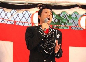 Yusuke Hama performs during a festival at the entrance to the Golden Gai entertainment area of Shinjuku