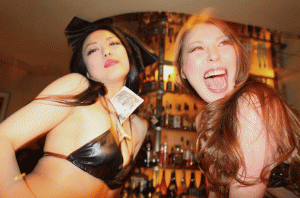 Erotic dancers at bar Red Shoes in Tokyo's Aoyama district