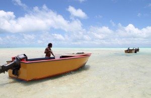 Fisherman in lagoon