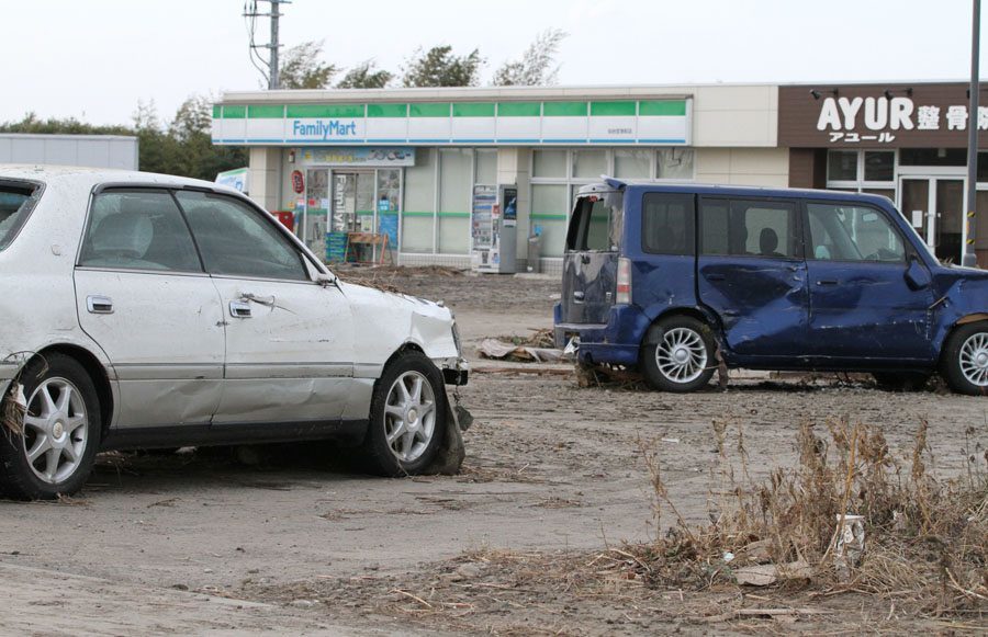 Cars in front of Family Mart convenience store along entrance road to Sendai Airport