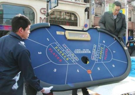 Police seized baccarat tables, slot machines and 4 million yen in cash