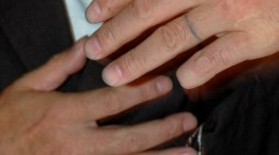 A gang member in Tokyo shows his means of atonement