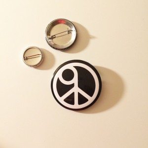 The pin worn by Dan (Tumblr)