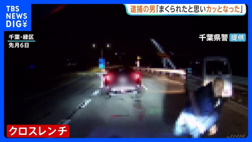 Man throws tire iron at car