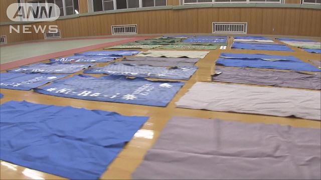Police found about 100 photo booth curtains in the home of a man in Toki City