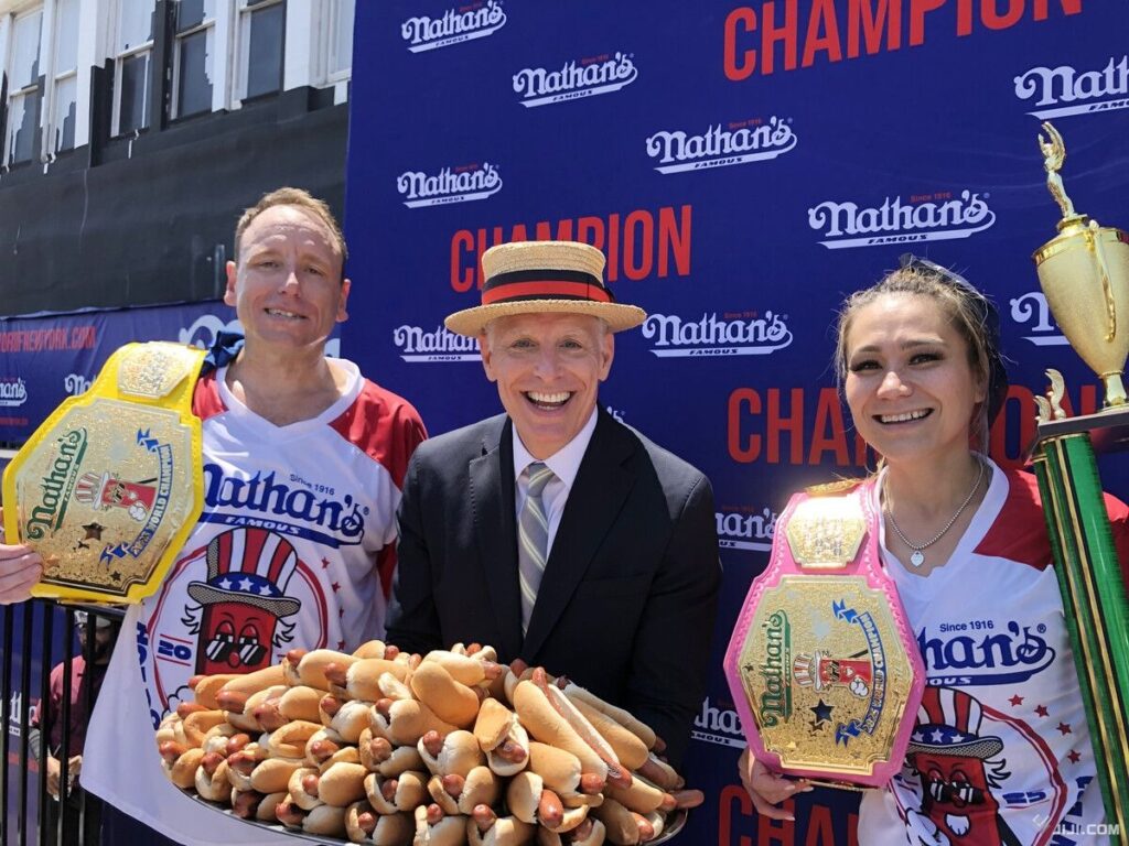 Joey Chestnut, left, and Miki Sudo, right