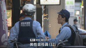 Aichi police outside a hotel in Nagoya