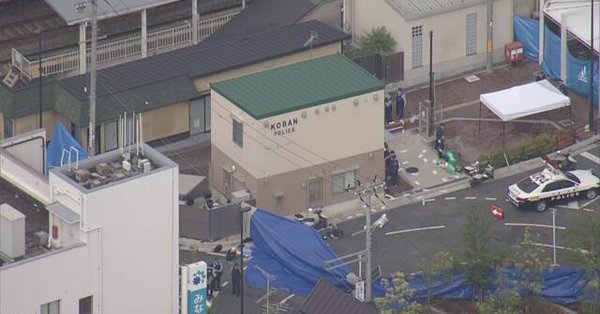 A police officer was stabbed in Suita City early Sunday