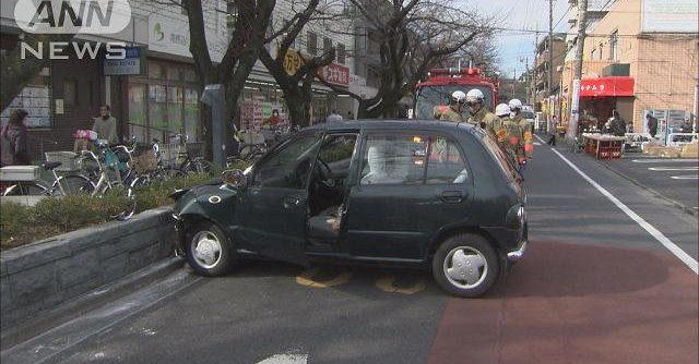 An elderly driver crashed into a concrete flower bed after mistaking the accelerator for the brakes in Tokyo (TV Asahi)