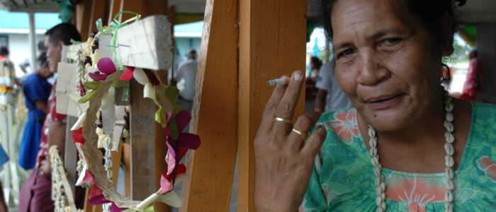 A woman sells souvenirs at Funafuti International Airport