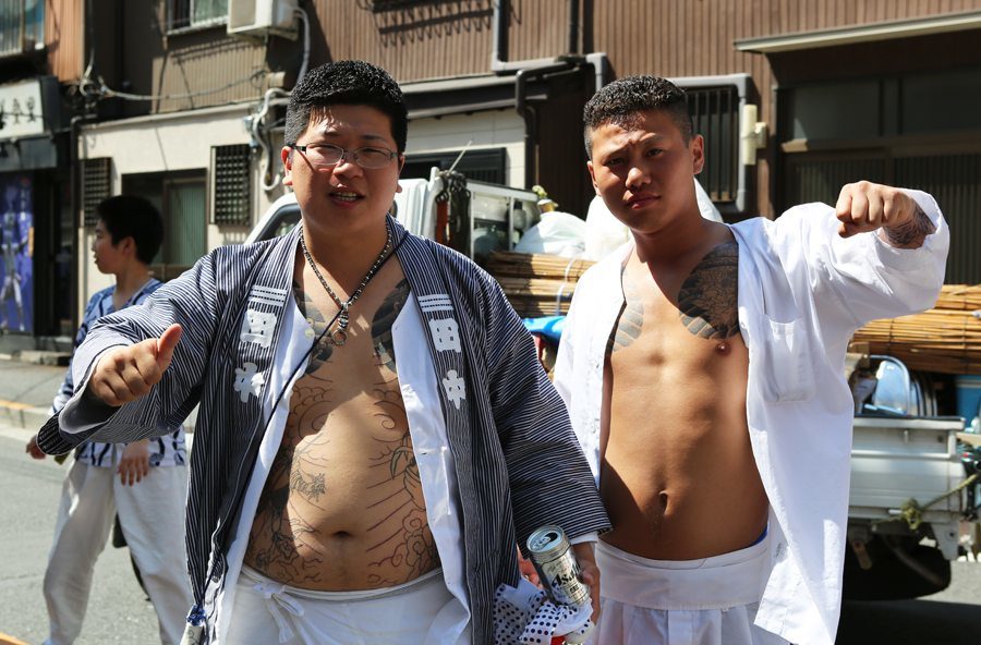 Two gang members take a break