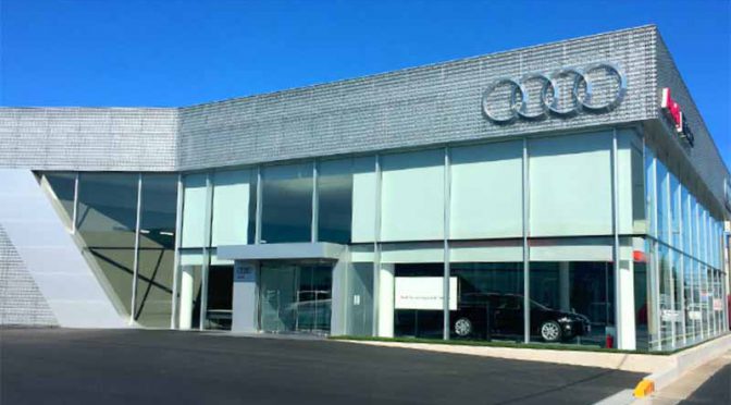 A salesman at an Audi dealer in Ritto City lost control of a vehicle and sent it careening into a concrete wall, seriously injuring a man tending to his garden