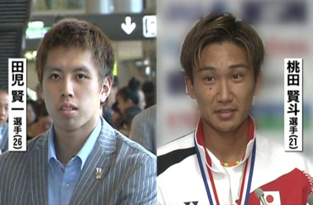 Kenichi Tago (L) and Kento Momota