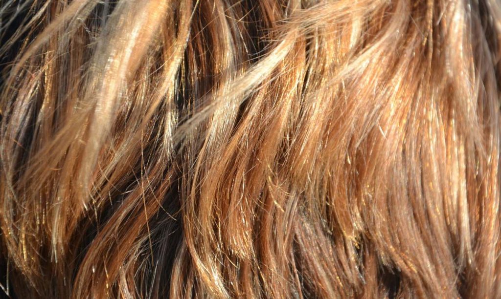 A girl, 18, has sued her high school in Osaka for forcing her to dye her naturally brown hair black