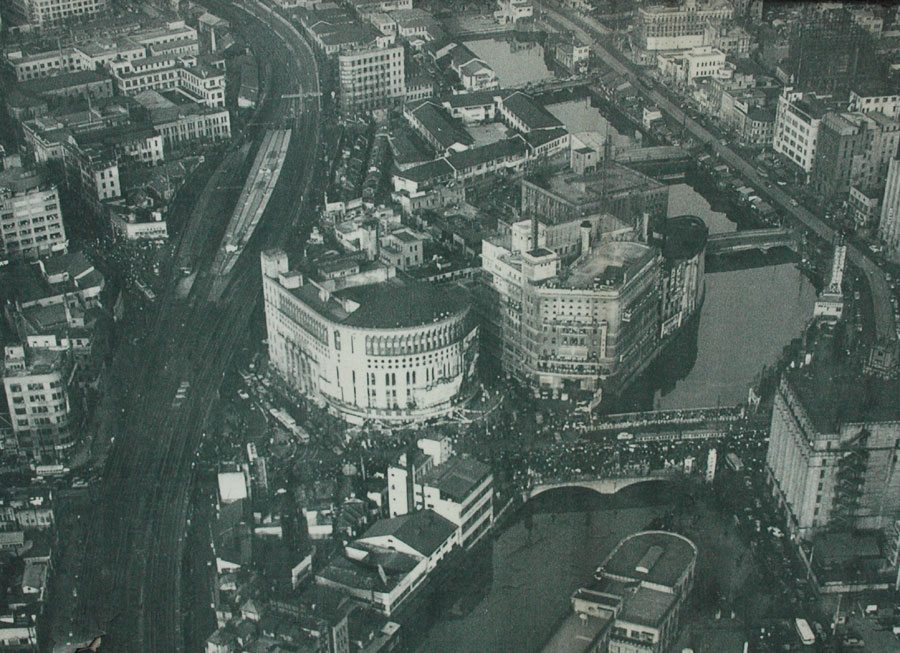 Nichigeki Theater, the site of nationalist rallies in the early '40s, is visible at the water's edge in 1953