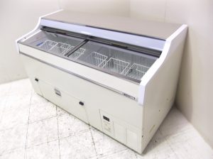 One suspect climbed into an ice cream freezer while the other took photographs