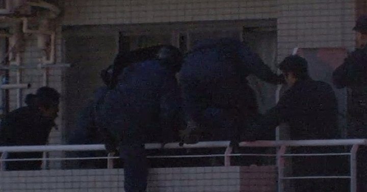 A woman with a knife barricaded herself inside her apartment in Yamato City for a seven-hour period