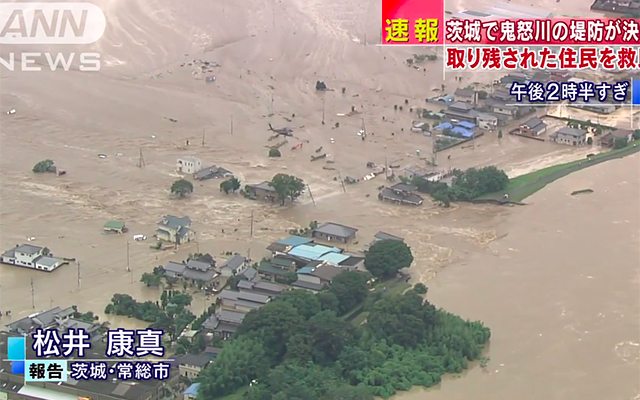 The Kinugawa River topped its banks in Joso City last week