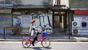 The Kamagasaki area is known for day laborers and homeless men roaming its alleys of flophouses and low-end eateries