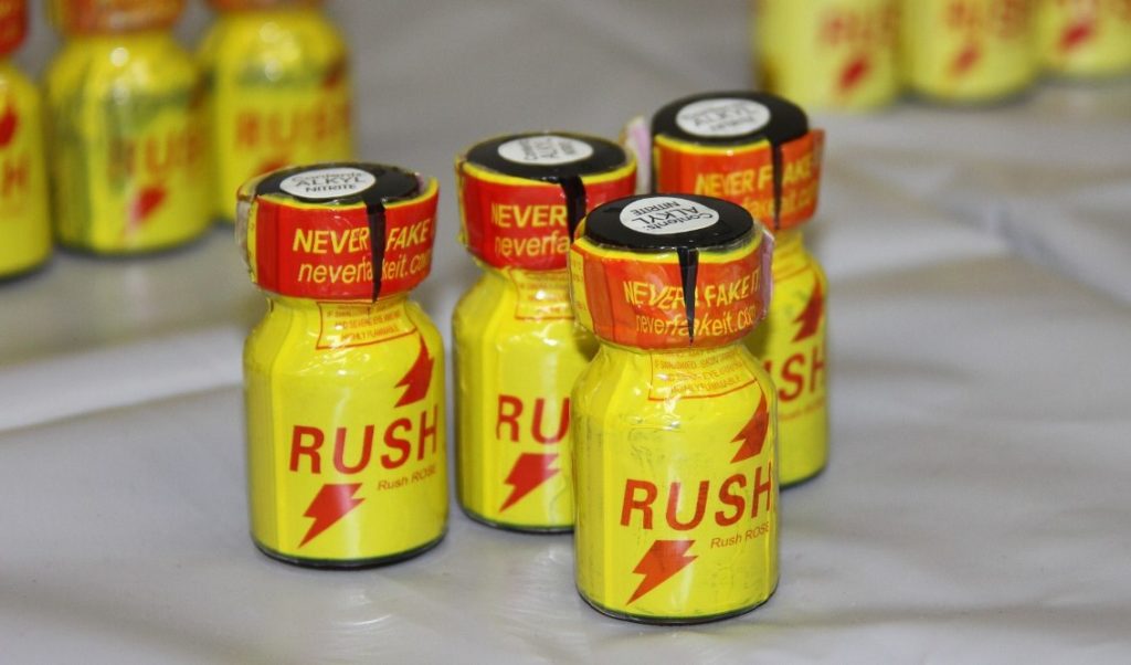 Police found several bottles of the 'poppers' drug Rush at the residence and inside an office locker of a TBS executive on June 8