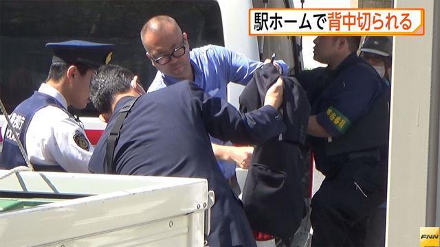 A man told police he could have been slashed in the back when he was stepping off a train at Tokyo Station on Monday